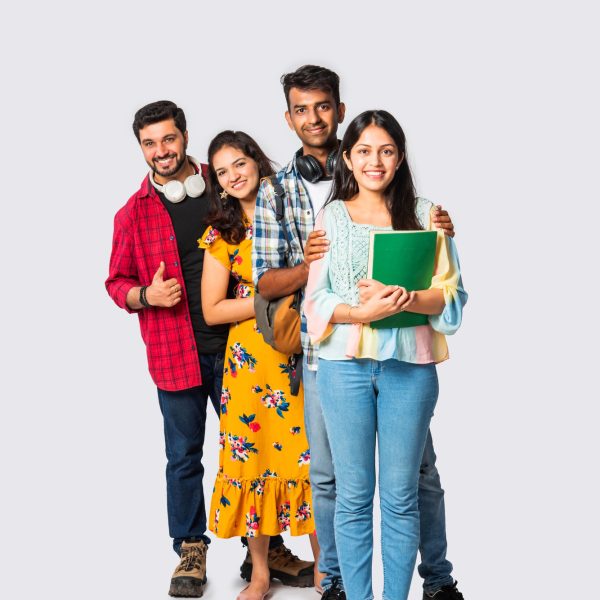Asian Indian smart college students posing for a photo against white background