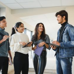 Cheerful Indian asian young group of college students.